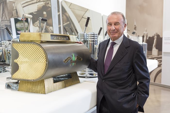 maurizio cimbali standing infront of La Cimbali espresso machine